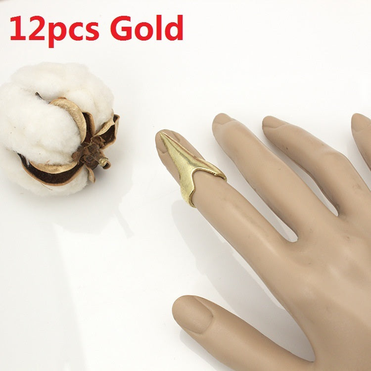 Gold claw ring from the 12-piece Gothic ring set, showcasing dramatic design and edgy style perfect for bold fashion.