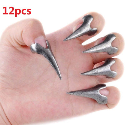 Hand showcasing a 12-piece Retro Punk Gothic ring set with dramatic claw shapes and spikes.