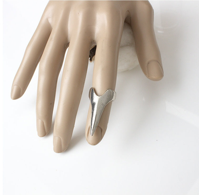 Dramatic claw ring showcased on a hand, perfect for gothic fashion and statement looks.