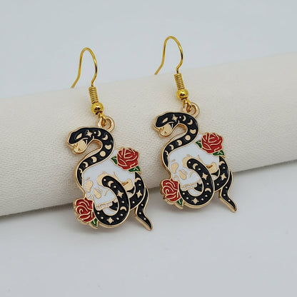 Snake Skull and Rose Gold Enamel Earrings