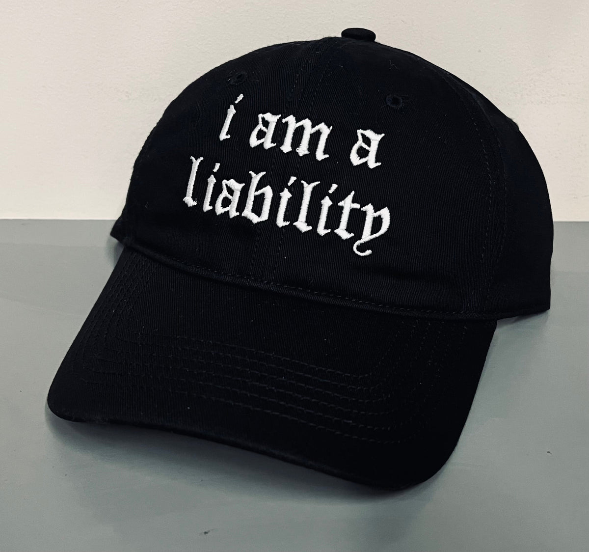 i am a liability - Embroidered Dad Hat
